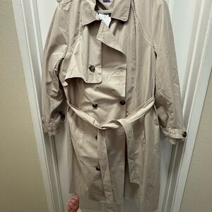 Seraphine baby wearing trench coat